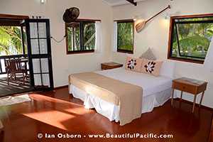 King bed in the absolute beach bungalow
