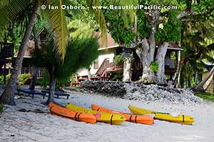kayaks beside the absolute beachfront villa